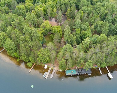 The nostalgic 3 season main lodge at the Froelich's Sayner Lodge on Plum Lake Golf Club in Wisconsin - for sale on GolfHomes.com, golf home, golf lot