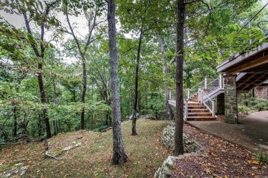 Discover an extraordinary opportunity to own a spectacular home on Indian Hills Country Club in Arkansas - for sale on GolfHomes.com, golf home, golf lot