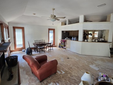 Unlock the potential of this lake home on highly sought-after on Lake Forest Yacht and Country Club in Alabama - for sale on GolfHomes.com, golf home, golf lot