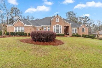 This stunning 5-bedroom, 3.5-bath home in the gated community of on Golden Eagle Country Club in Florida - for sale on GolfHomes.com, golf home, golf lot