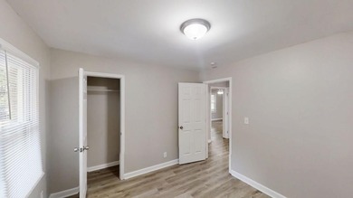 Welcome to this beautifully updated 3-bedroom, 1-bath ranch on Browns Mill Golf Course in Georgia - for sale on GolfHomes.com, golf home, golf lot