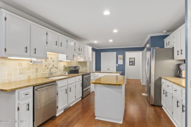 Welcome to this beautifully maintained traditional brick home on Brandywine Bay Golf Club in North Carolina - for sale on GolfHomes.com, golf home, golf lot