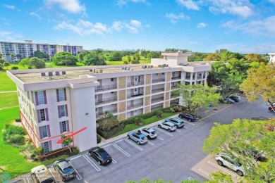 This beautifully updated 1st-floor corner condo offers a perfect on Palm-Aire Country Club and Resort - Palms in Florida - for sale on GolfHomes.com, golf home, golf lot