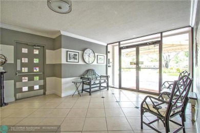 This beautifully updated 1st-floor corner condo offers a perfect on Palm-Aire Country Club and Resort - Palms in Florida - for sale on GolfHomes.com, golf home, golf lot