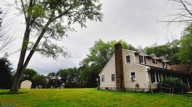 This sprawling home, tucked away down a quiet country road, is on Hidden Acres Golf Course in New Jersey - for sale on GolfHomes.com, golf home, golf lot