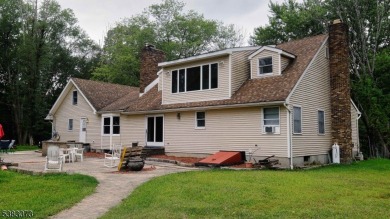 This sprawling home, tucked away down a quiet country road, is on Hidden Acres Golf Course in New Jersey - for sale on GolfHomes.com, golf home, golf lot