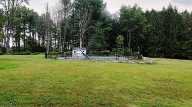 This sprawling home, tucked away down a quiet country road, is on Hidden Acres Golf Course in New Jersey - for sale on GolfHomes.com, golf home, golf lot