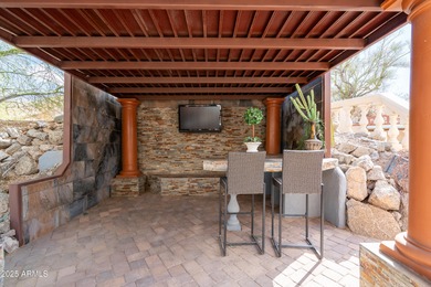 Experience elevated desert luxury in this beautifully crafted 4 on Estrella Mountain Ranch Golf Course in Arizona - for sale on GolfHomes.com, golf home, golf lot