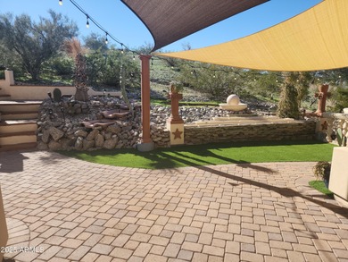 Experience elevated desert luxury in this beautifully crafted 4 on Estrella Mountain Ranch Golf Course in Arizona - for sale on GolfHomes.com, golf home, golf lot