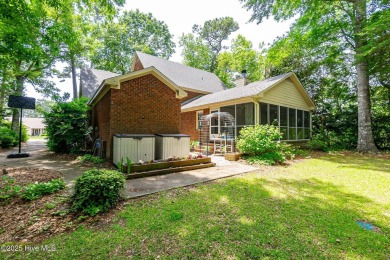 Welcome to this beautifully maintained traditional brick home on Brandywine Bay Golf Club in North Carolina - for sale on GolfHomes.com, golf home, golf lot