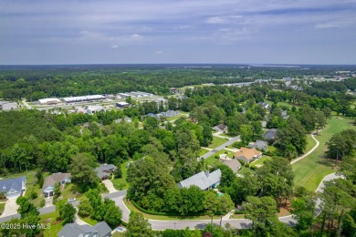 Welcome to this beautifully maintained traditional brick home on Brandywine Bay Golf Club in North Carolina - for sale on GolfHomes.com, golf home, golf lot