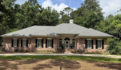 NEW ROOF May 2025! Discover the perfect blend of elegance and on Golden Eagle Country Club in Florida - for sale on GolfHomes.com, golf home, golf lot