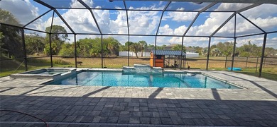 Stunning Upgraded Custom Pool/SPA Home with 4 Bedrooms + BONUS on Bobcat Trail Golf Club in Florida - for sale on GolfHomes.com, golf home, golf lot