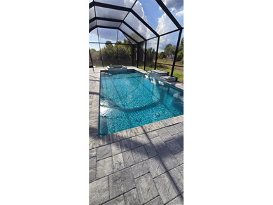 Stunning Upgraded Custom Pool/SPA Home with 4 Bedrooms + BONUS on Bobcat Trail Golf Club in Florida - for sale on GolfHomes.com, golf home, golf lot