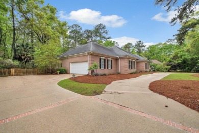 NEW ROOF May 2025! Discover the perfect blend of elegance and on Golden Eagle Country Club in Florida - for sale on GolfHomes.com, golf home, golf lot