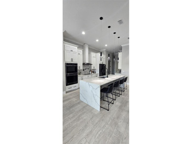 Stunning Upgraded Custom Pool/SPA Home with 4 Bedrooms + BONUS on Bobcat Trail Golf Club in Florida - for sale on GolfHomes.com, golf home, golf lot