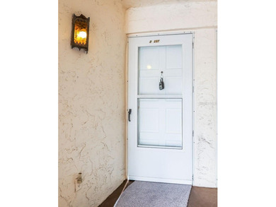 Beautifully updated condo offering modern comfort, effortless on East Bay Golf Club in Florida - for sale on GolfHomes.com, golf home, golf lot