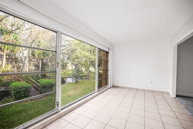 Beautifully updated condo offering modern comfort, effortless on East Bay Golf Club in Florida - for sale on GolfHomes.com, golf home, golf lot