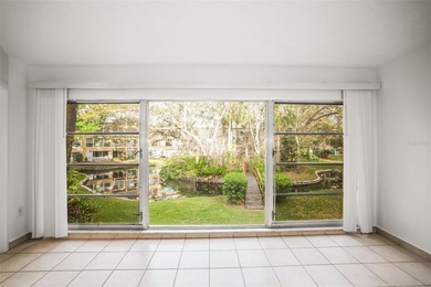 Beautifully updated condo offering modern comfort, effortless on East Bay Golf Club in Florida - for sale on GolfHomes.com, golf home, golf lot