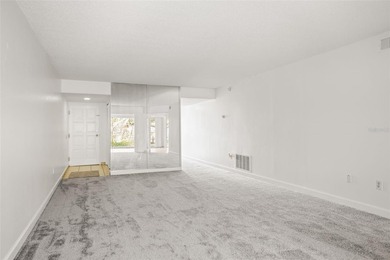 Beautifully updated condo offering modern comfort, effortless on East Bay Golf Club in Florida - for sale on GolfHomes.com, golf home, golf lot