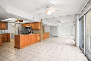 Beautifully updated condo offering modern comfort, effortless on East Bay Golf Club in Florida - for sale on GolfHomes.com, golf home, golf lot