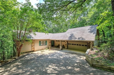 Nestled along the 5th fairway of the scenic Bent Tree golf on Bent Tree Golf Course in Georgia - for sale on GolfHomes.com, golf home, golf lot