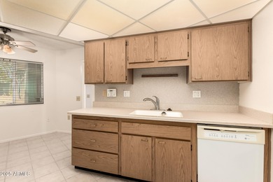 Welcome to this charming end unit in the 55+ Dawn Camp at in on Sun City Riverview Golf Course in Arizona - for sale on GolfHomes.com, golf home, golf lot