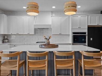 This stunning home, located at the corner of holes 15 and 16 on The Lake Country Club - Lake Waco in Texas - for sale on GolfHomes.com, golf home, golf lot
