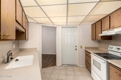 Welcome to this charming end unit in the 55+ Dawn Camp at in on Sun City Riverview Golf Course in Arizona - for sale on GolfHomes.com, golf home, golf lot