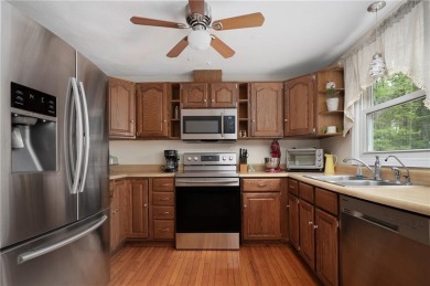 Charming corner-lot home near golf, trails  beaches!

Welcome to on Pinecrest Golf Course in Rhode Island - for sale on GolfHomes.com, golf home, golf lot