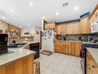 Welcome to this beautifully crafted riverfront home along the on Thunder Bay Golf Resort in Michigan - for sale on GolfHomes.com, golf home, golf lot