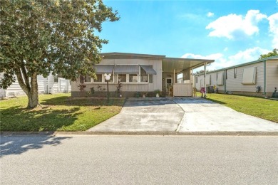 Ready for some Fun in the Sun! Welcome to Barefoot Bay! Adorable on Barefoot Bay Golf Course in Florida - for sale on GolfHomes.com, golf home, golf lot