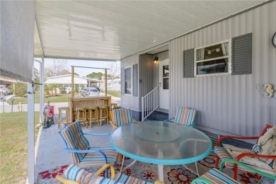 Ready for some Fun in the Sun! Welcome to Barefoot Bay! Adorable on Barefoot Bay Golf Course in Florida - for sale on GolfHomes.com, golf home, golf lot