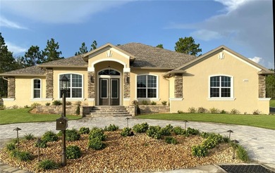 5 Bedroom Custom Home | Boat & RV Garage | Outdoor Kitchen | on Juliette Falls Golf and Spa Club in Florida - for sale on GolfHomes.com, golf home, golf lot