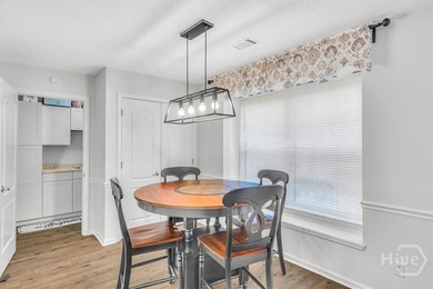 Classic all-brick home perfectly positioned on Hole 1 of the on Cherokee Rose Country Club in Georgia - for sale on GolfHomes.com, golf home, golf lot