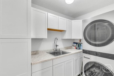 Classic all-brick home perfectly positioned on Hole 1 of the on Cherokee Rose Country Club in Georgia - for sale on GolfHomes.com, golf home, golf lot