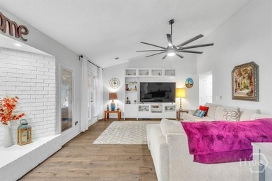 Classic all-brick home perfectly positioned on Hole 1 of the on Cherokee Rose Country Club in Georgia - for sale on GolfHomes.com, golf home, golf lot