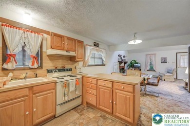 Golf-Course Living At Its Best! Well-Loved Pocono Contemporary on Pocono Farms Country Club in Pennsylvania - for sale on GolfHomes.com, golf home, golf lot