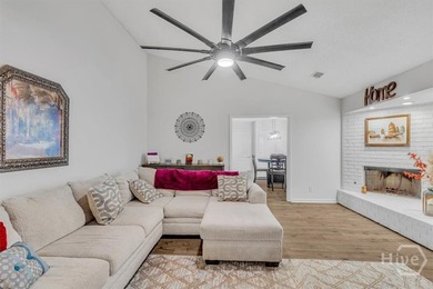 Classic all-brick home perfectly positioned on Hole 1 of the on Cherokee Rose Country Club in Georgia - for sale on GolfHomes.com, golf home, golf lot