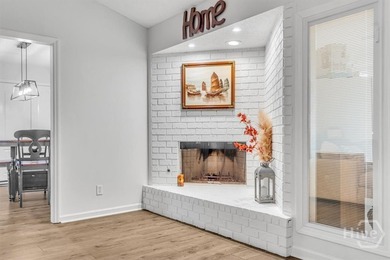 Classic all-brick home perfectly positioned on Hole 1 of the on Cherokee Rose Country Club in Georgia - for sale on GolfHomes.com, golf home, golf lot