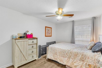 Classic all-brick home perfectly positioned on Hole 1 of the on Cherokee Rose Country Club in Georgia - for sale on GolfHomes.com, golf home, golf lot