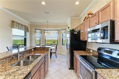 YOU CAN SEE FOR MILES from this TOP FLOOR, TURNKEY residence in on River Strand Golf and Country Club At Heritage Harbour  in Florida - for sale on GolfHomes.com, golf home, golf lot