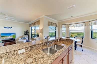 YOU CAN SEE FOR MILES from this TOP FLOOR, TURNKEY residence in on River Strand Golf and Country Club At Heritage Harbour  in Florida - for sale on GolfHomes.com, golf home, golf lot