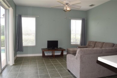 This Pool Home offers picturesque golf course views and features on Tampa Bay Golf and Country Club in Florida - for sale on GolfHomes.com, golf home, golf lot