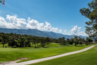 Nestled in SaddleBrooke, located in the Catalina foothills just on Saddlebrooke Golf Course in Arizona - for sale on GolfHomes.com, golf home, golf lot