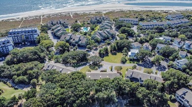 Turn-key coastal living just steps from the beach! This on Wild Dunes Harbor Golf Resort in South Carolina - for sale on GolfHomes.com, golf home, golf lot