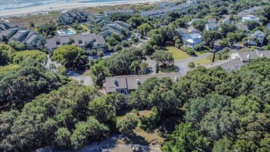 Turn-key coastal living just steps from the beach! This on Wild Dunes Harbor Golf Resort in South Carolina - for sale on GolfHomes.com, golf home, golf lot