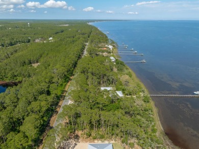 Enjoy views of the Gulf on this waterfront, 1-acre parcel with on St. James Bay in Florida - for sale on GolfHomes.com, golf home, golf lot
