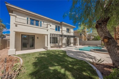 Nestled in a prestigious guard-gated community, this stunning on TPC Las Vegas in Nevada - for sale on GolfHomes.com, golf home, golf lot