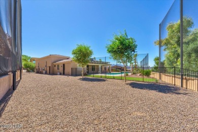This extraordinary residence is a masterpiece of open-concept on London Bridge Golf Course in Arizona - for sale on GolfHomes.com, golf home, golf lot